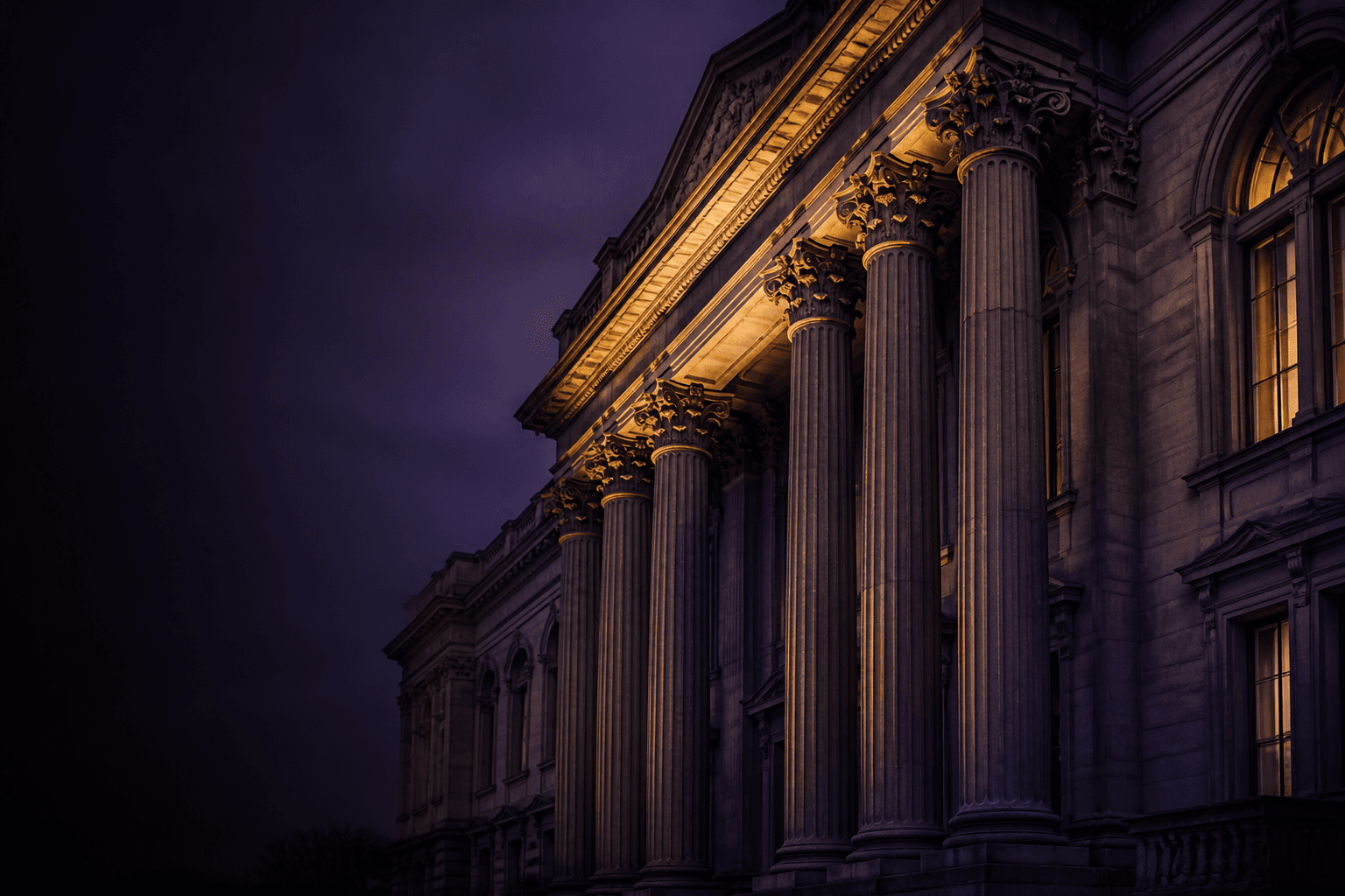 Historic colonnade at dusk, colour-graded in plum with gold rim light